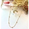 Chaine fine petits grains en or 18 carats