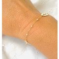Bracelet religieux en or, nacre et email blanc