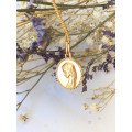 Médaille de la Vierge ovale avec bord facetté 17 mm - plaqué or