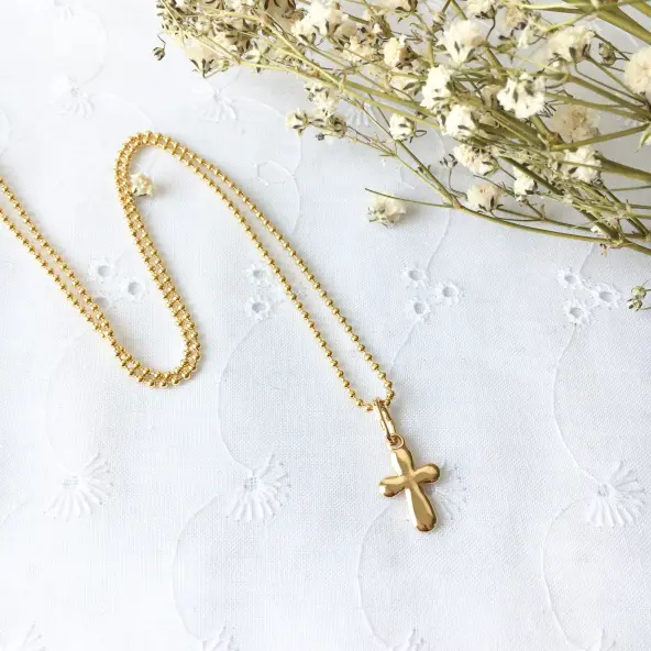 Croix arrondie 15 mm - plaqué or