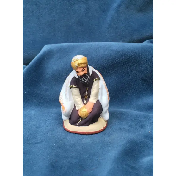 Roi Mage à genoux - Le Moulin à Huile