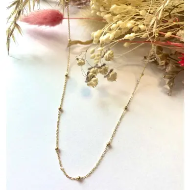 Chaine fine petits grains en or 18 carats