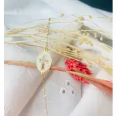 Bracelet religieux en or, nacre et email blanc - 1
