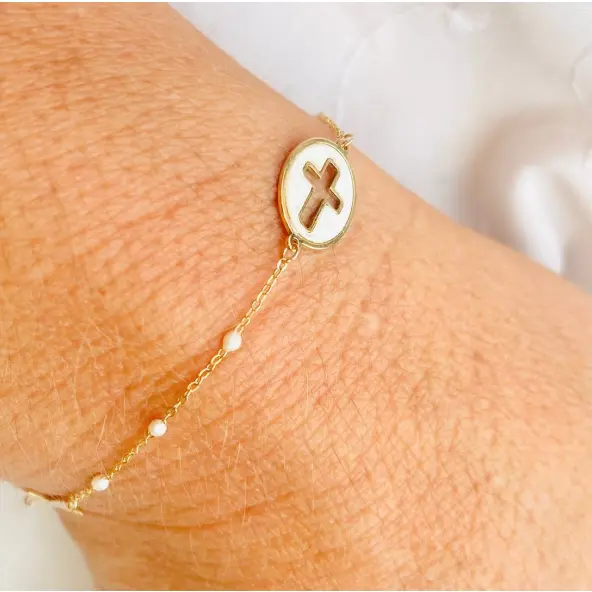 Bracelet religieux en or, nacre et email blanc