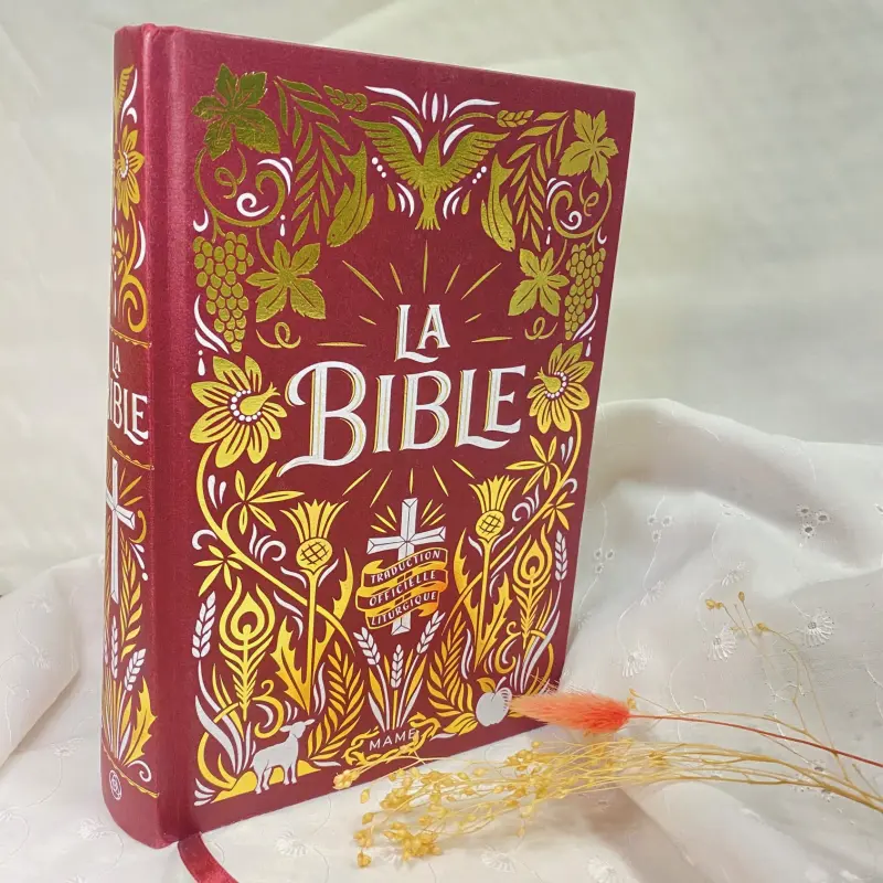 La Bible reliée avec jaspage bordeaux